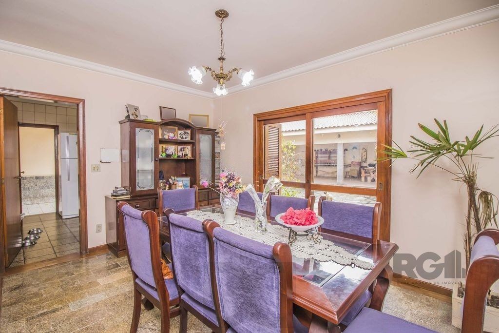 Casa de 329m² - 4 dormitórios, 1 suíte, 6 vagas no bairro Vila Jardim — foto 8