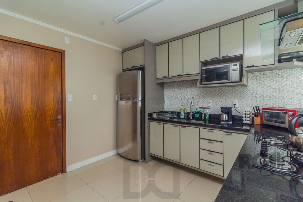 Casa com 3 dormitórios no bairro Nonoai — foto 28