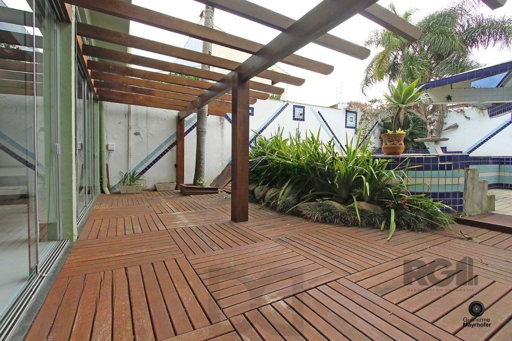 Casa com 5 suítes, 7 banheiros, 4 vagas no bairro Partenon — foto 49