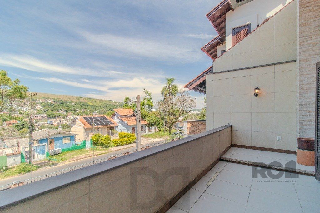 Linda casa de 04 dormitórios com vista livre no Bairro Teresópolis — foto 10