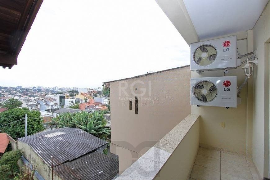 EXCELENTE CASA COM 4 DORMITÓRIOS, 6 VAGAS DE GARAGEM E VISTA PANORÂMICA. — foto 14