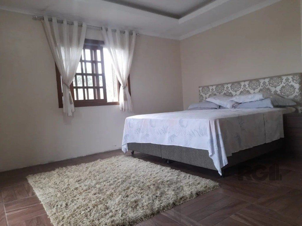Casa com 3 dormitórios no bairro Lomba do Pinheiro — foto 12
