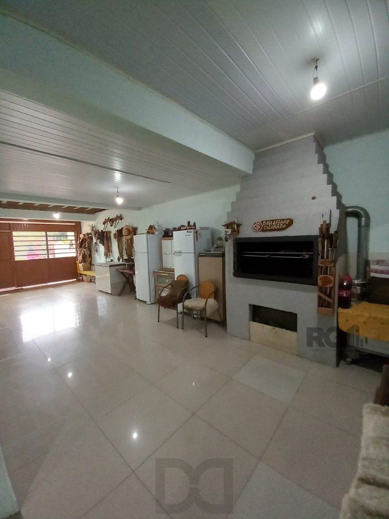 Casa com 4 dormitórios no bairro Vila Nova — foto 14