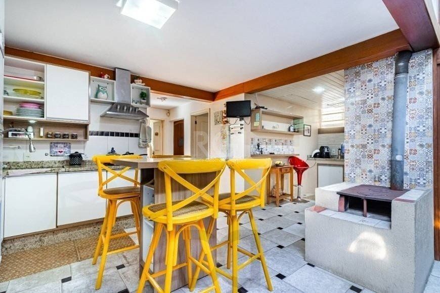 Excelente casa de 264m² com 4 dormitórios no bairro Menino Deus — foto 8