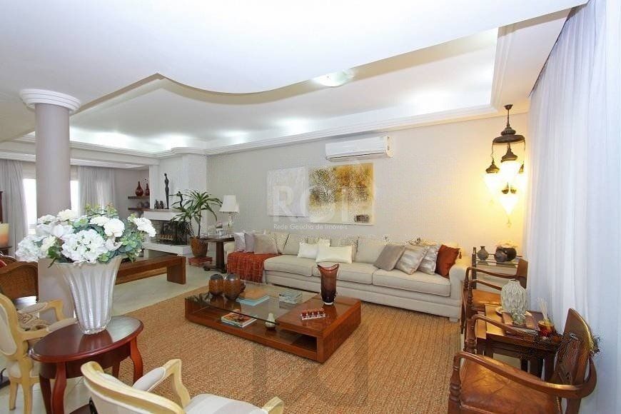 EXCELENTE CASA COM 4 DORMITÓRIOS, 6 VAGAS DE GARAGEM E VISTA PANORÂMICA. — foto 3