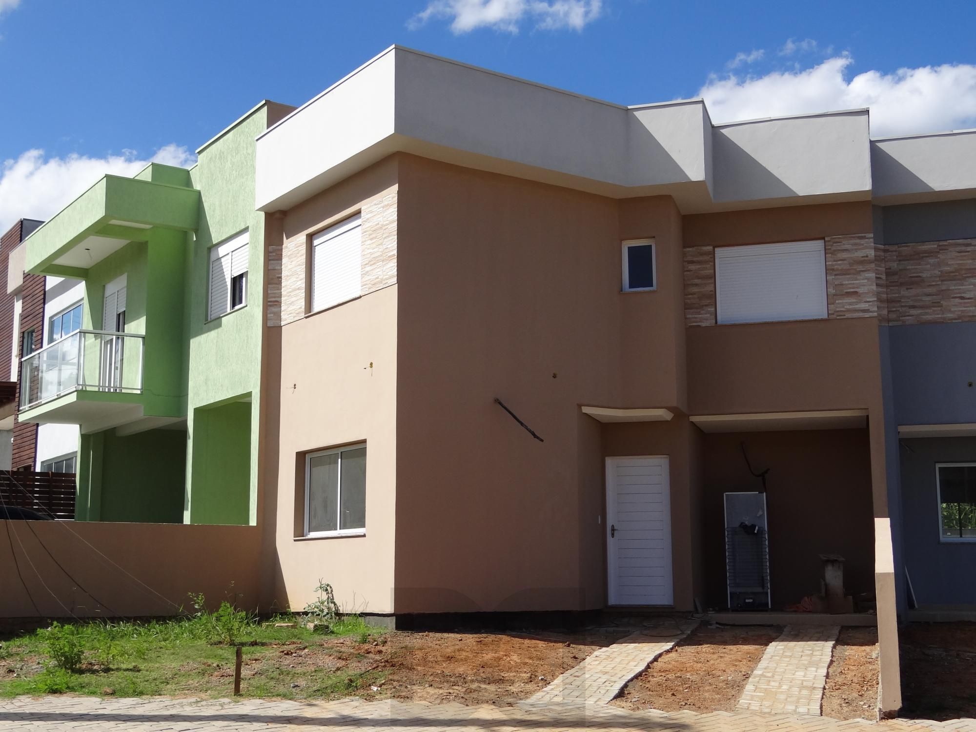 Casa com 3 dormitórios no bairro Mário Quintana — foto 1