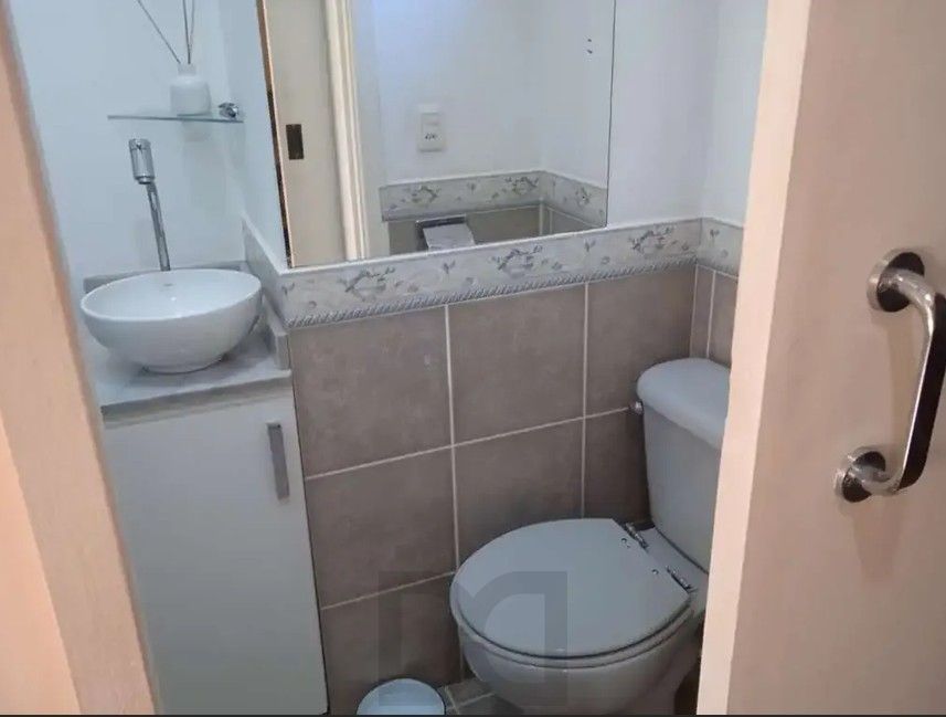 Casa em condomínio no Bairro Medianeira, com 3 dormitórios, sendo 1 suíte, e 1 vaga de garagem. — foto 23