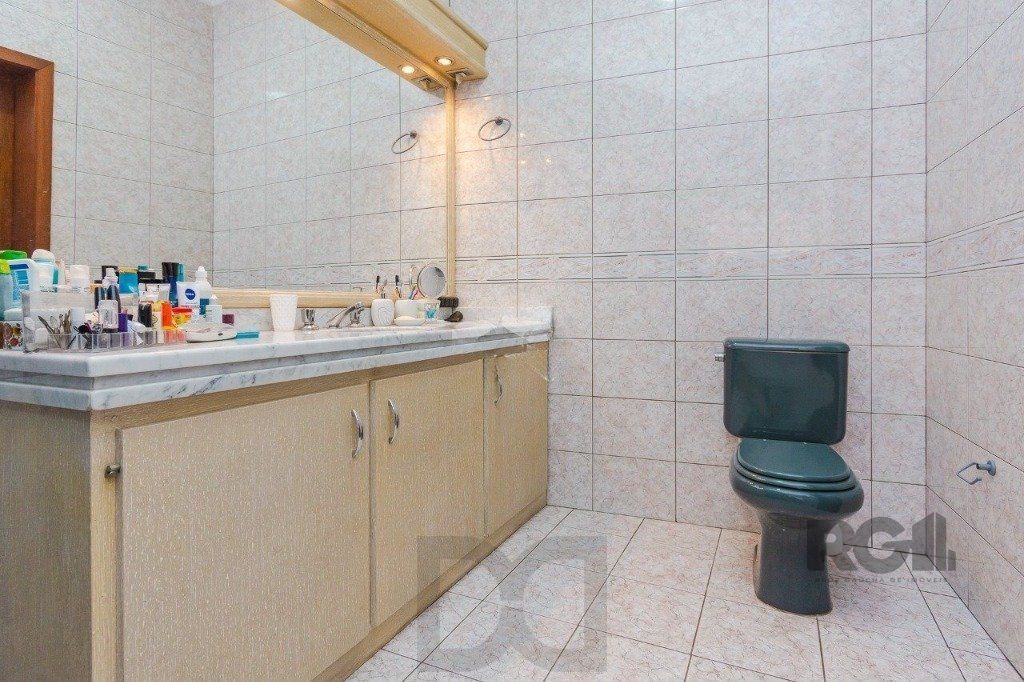 Casa com 4 dormitórios no bairro Morro Santana — foto 13
