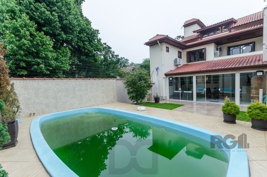 Excelente casa de 379m² com 3 dormitórios, piscina e 4 vagas. — foto 16
