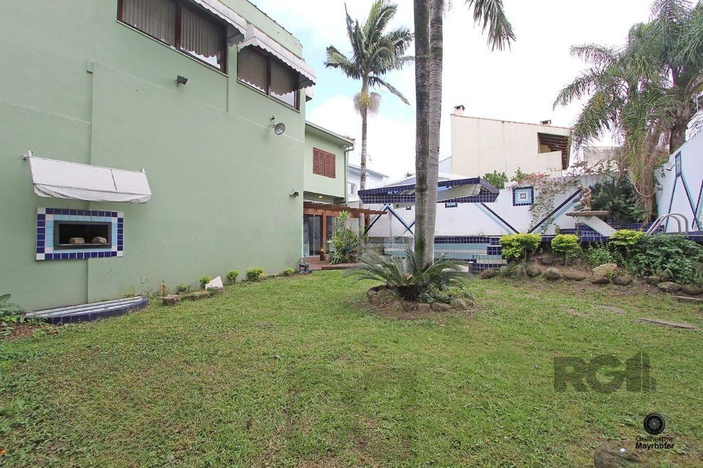 Casa com 5 suítes, 7 banheiros, 4 vagas no bairro Partenon — foto 56