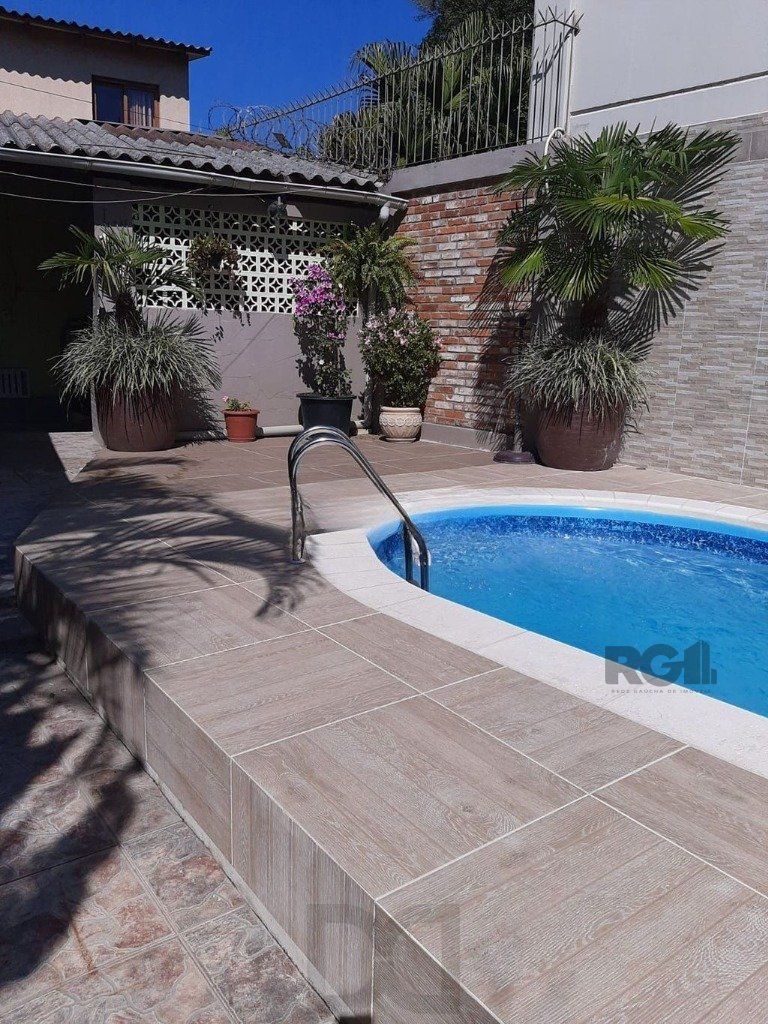 Casa de 4 dormitórios no bairro Glória — foto 36