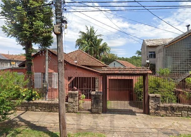 Casa de 03 dormitórios com suite à venda no bairro Medianeira, Porto Alegre — foto 1