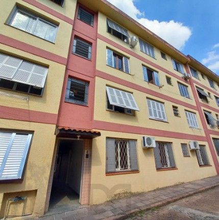 Apartamento de 3 dormitórios com vaga de garagem coberta e escriturada no bairro Partenon. — foto 23