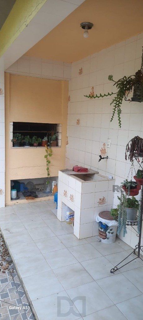 Casa de 4 quartos com 243,58m² no Bairro Lomba do Pinheiro — foto 7