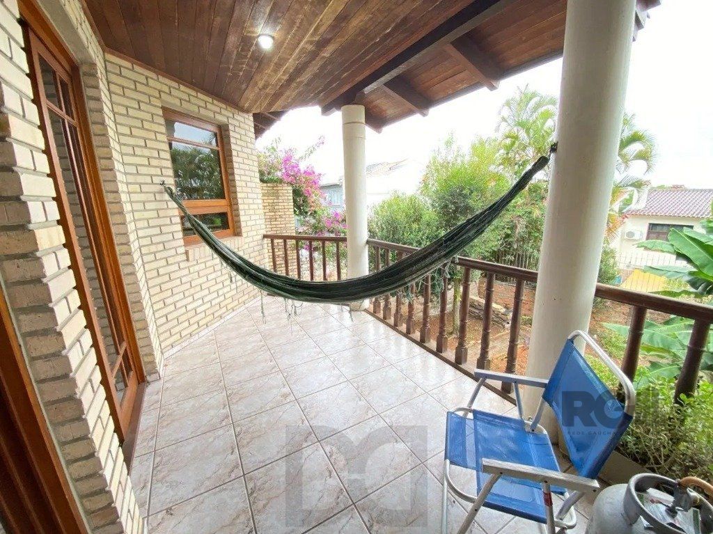 Casa com 4 dormitórios no bairro nonoai — foto 18