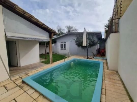 Casa 3 Dormitórios com Piscina à Venda no Guarujá – Zona Sul de Porto Alegre — foto 13