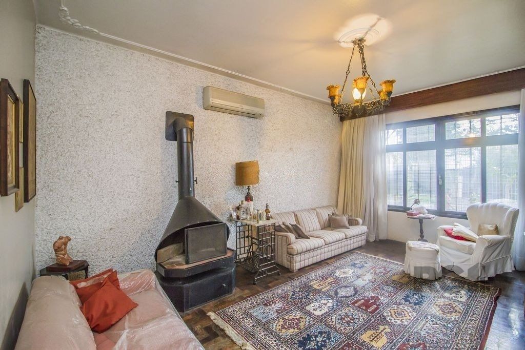 Casa de 4 dormitórios, bairro Santa Tereza — foto 2