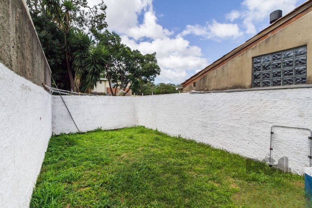 Casa de 117m² - 3 dormitórios e 1 vaga no bairro Hípica — foto 26