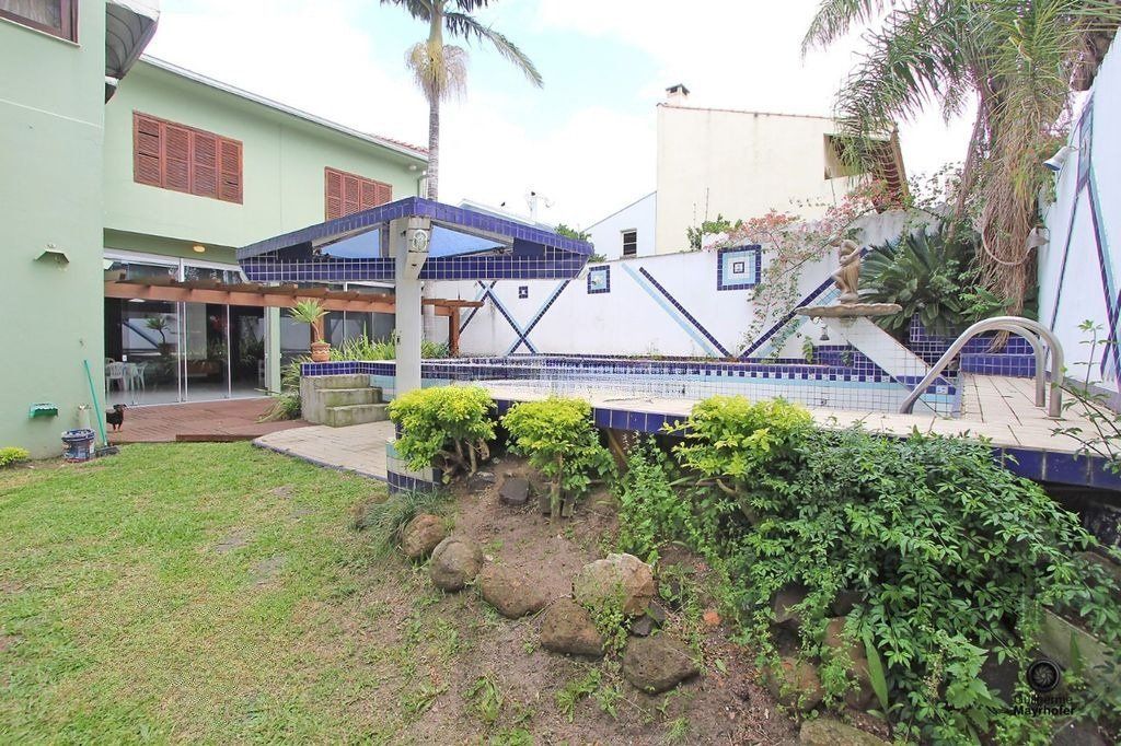 Casa com 5 suítes, 7 banheiros, 4 vagas no bairro Partenon — foto 53