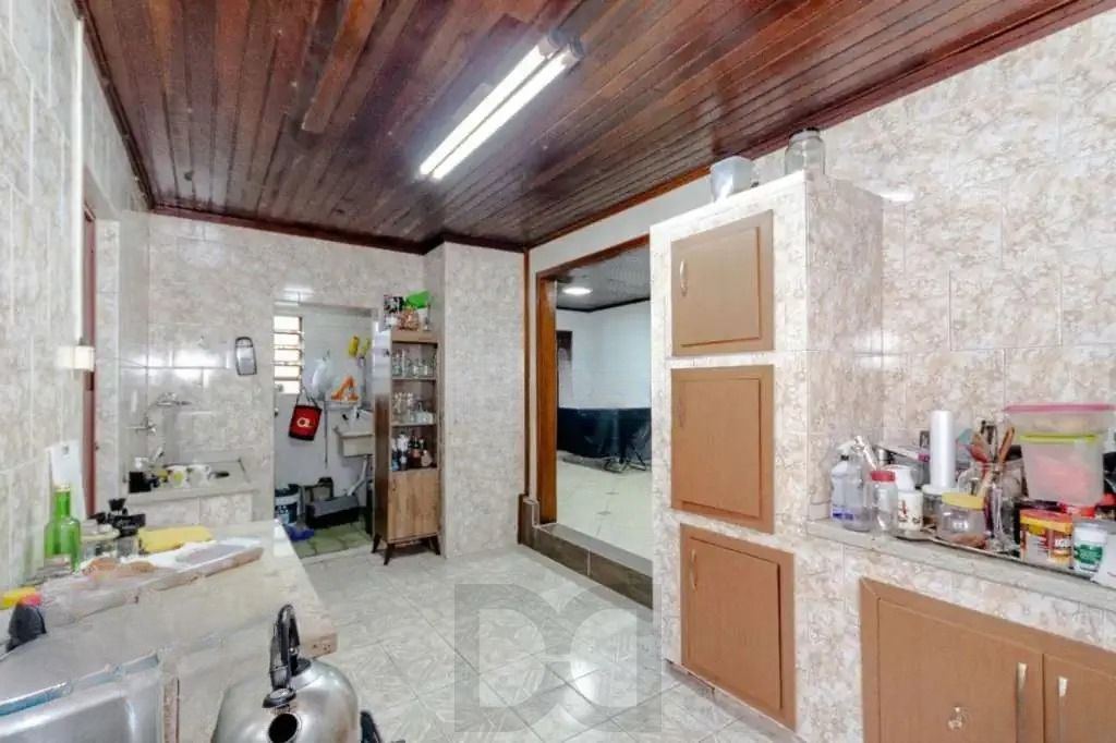 Casa à venda com 3 dormitórios, 1 suíte e espaço gourmet em terreno alto — foto 12