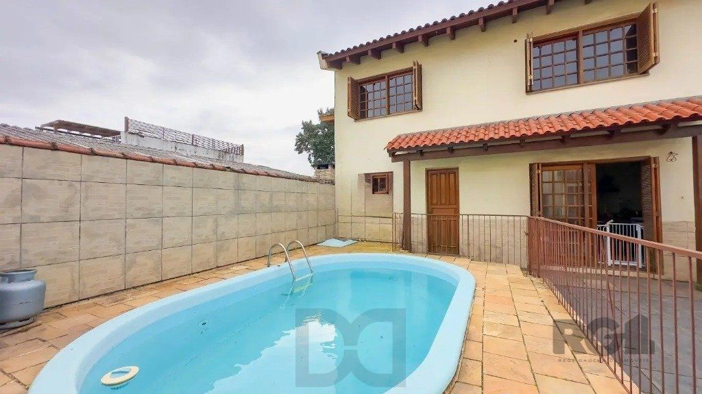 Casa com 4 quartos no bairro nonoai — foto 1