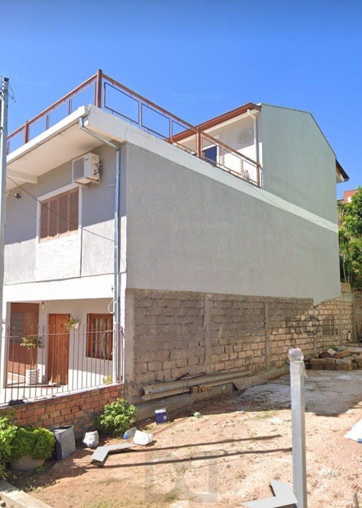 Casa com 4 dormitórios no bairro Vila Nova — foto 1