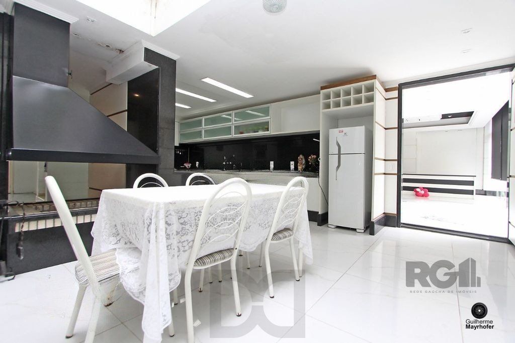 Casa com 5 suítes, 7 banheiros, 4 vagas no bairro Partenon — foto 42