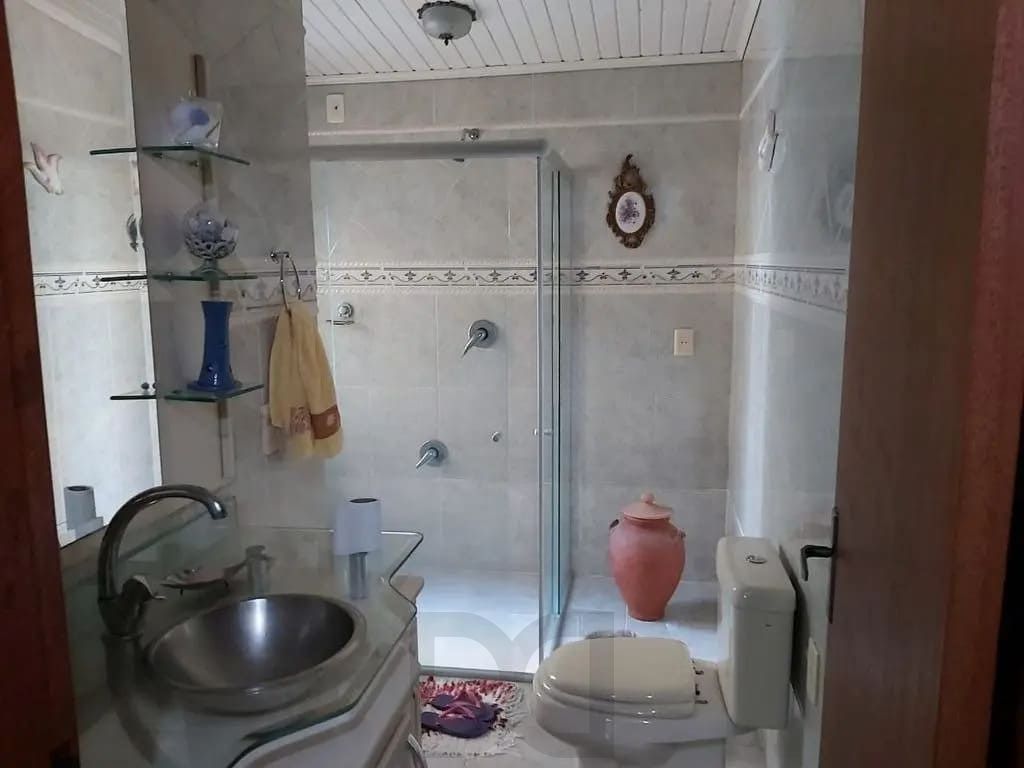 Casa com 4 dormitórios no bairro Passo da Areia — foto 7
