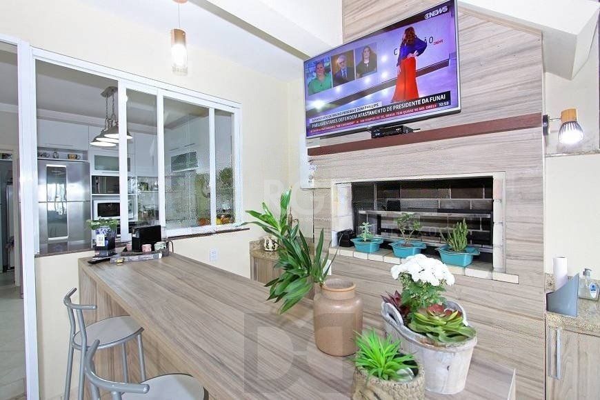 EXCELENTE CASA COM 4 DORMITÓRIOS, 6 VAGAS DE GARAGEM E VISTA PANORÂMICA. — foto 18