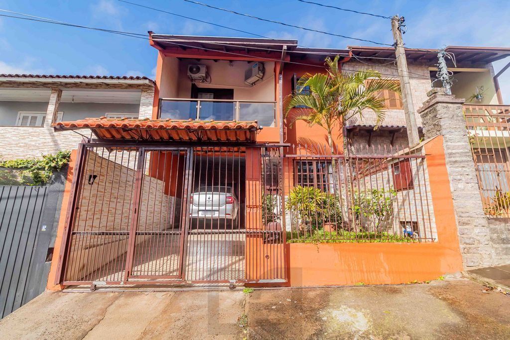 Casa de 3 dormitórios à venda Bairro Rubem Berta - Porto Alegre — foto 1