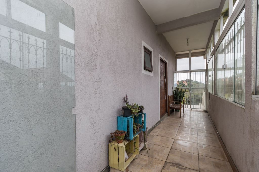 Casa de 6 dormitórios à venda Bairro Vila Nova - Porto Alegre — foto 33