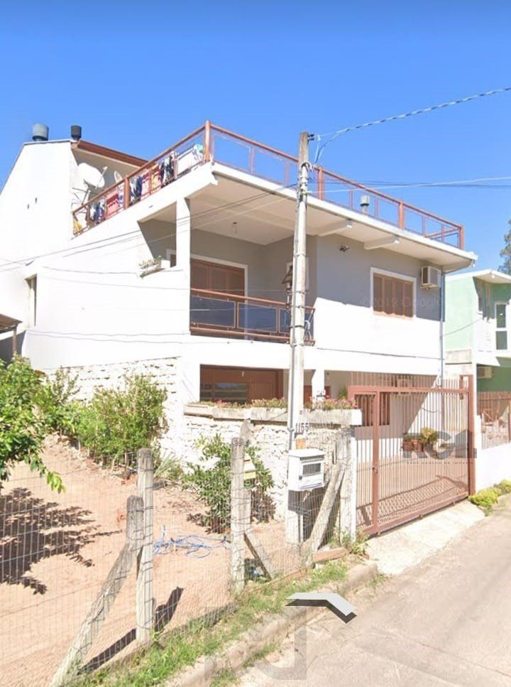 Casa com 4 dormitórios no bairro Vila Nova — foto 2