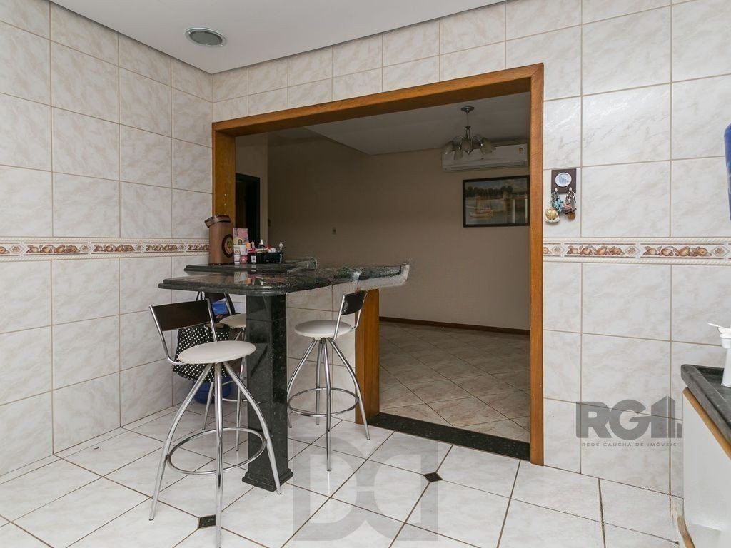 Casa de 3 dormitórios, no bairro Campo Novo — foto 4