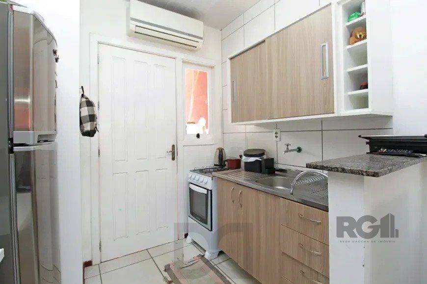 Excelente casa de 45m² com 1 dormitório e 1 vaga no bairro Hípica. — foto 4