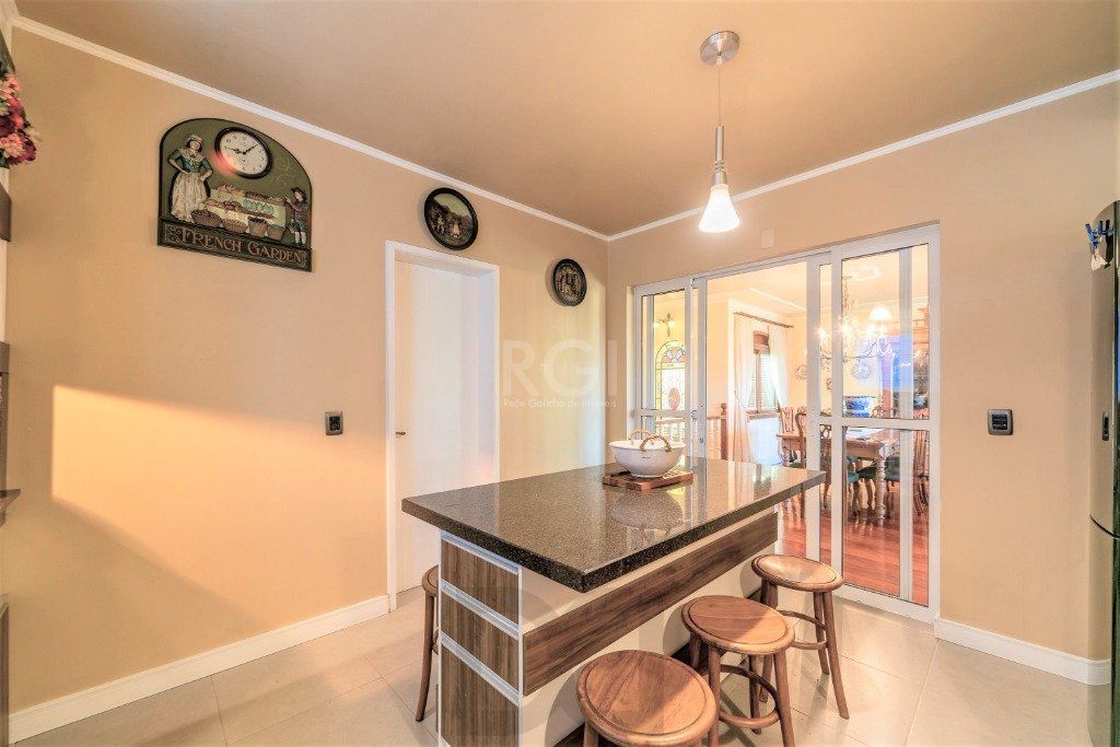 Casa de 3 dormitórios e 4 vagas de garagem no bairro Jardim Itu — foto 5