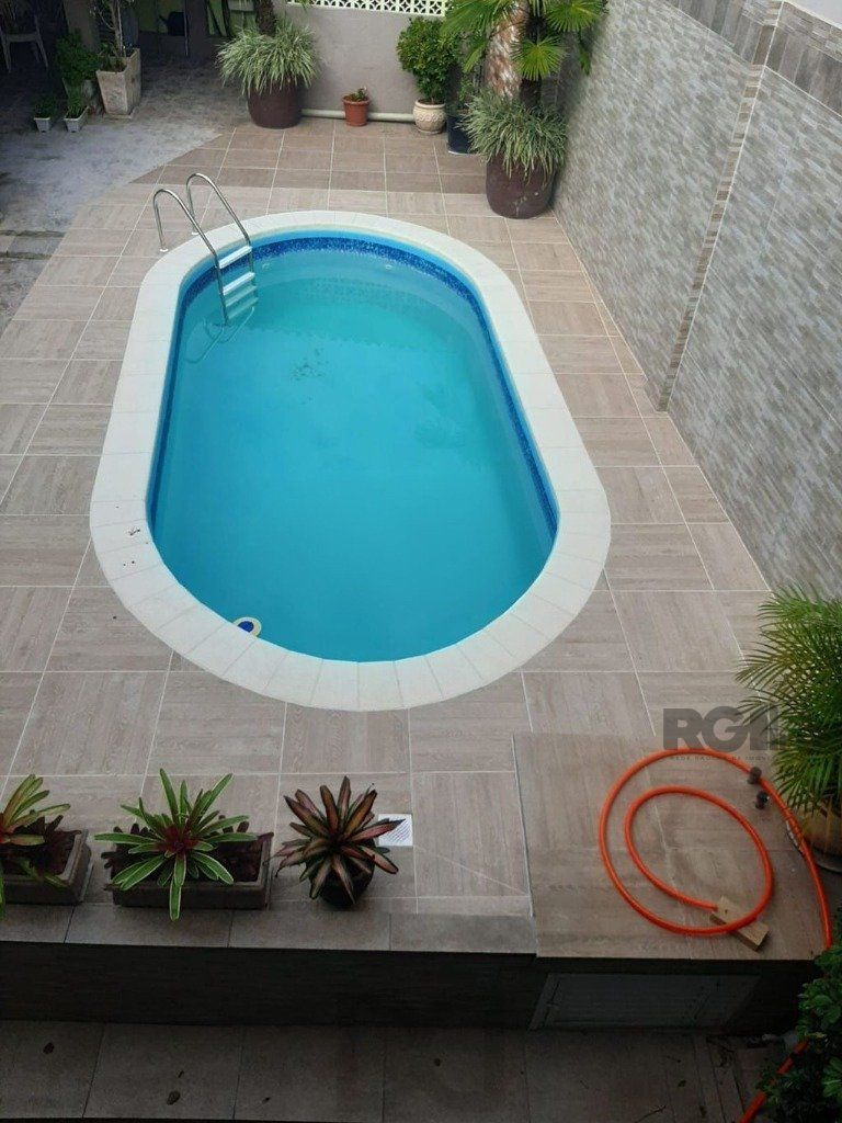 Casa de 4 dormitórios no bairro Glória — foto 37