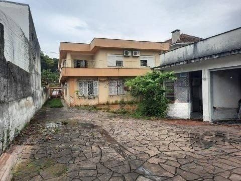 OPORTUNIDADE DE NEGÓCIO! PONTO COMERCIAL OU RESIDENCIAL, terreno medindo 13m x 100m, com 02 lojas comercias em frente (atualmente alugadas), nos fundos possui sobrado com 03 dormitórios sendo 01 suí — foto 8
