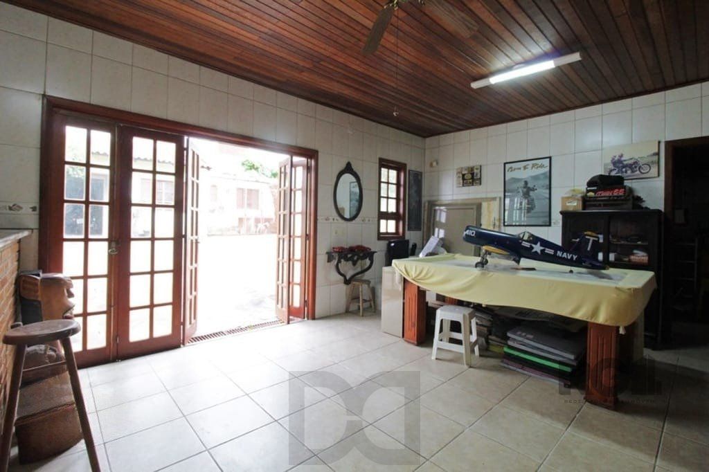 Casa de 275m² - 3 dormitórios e 3 vagas no bairro Coronel Aparício Borges — foto 32