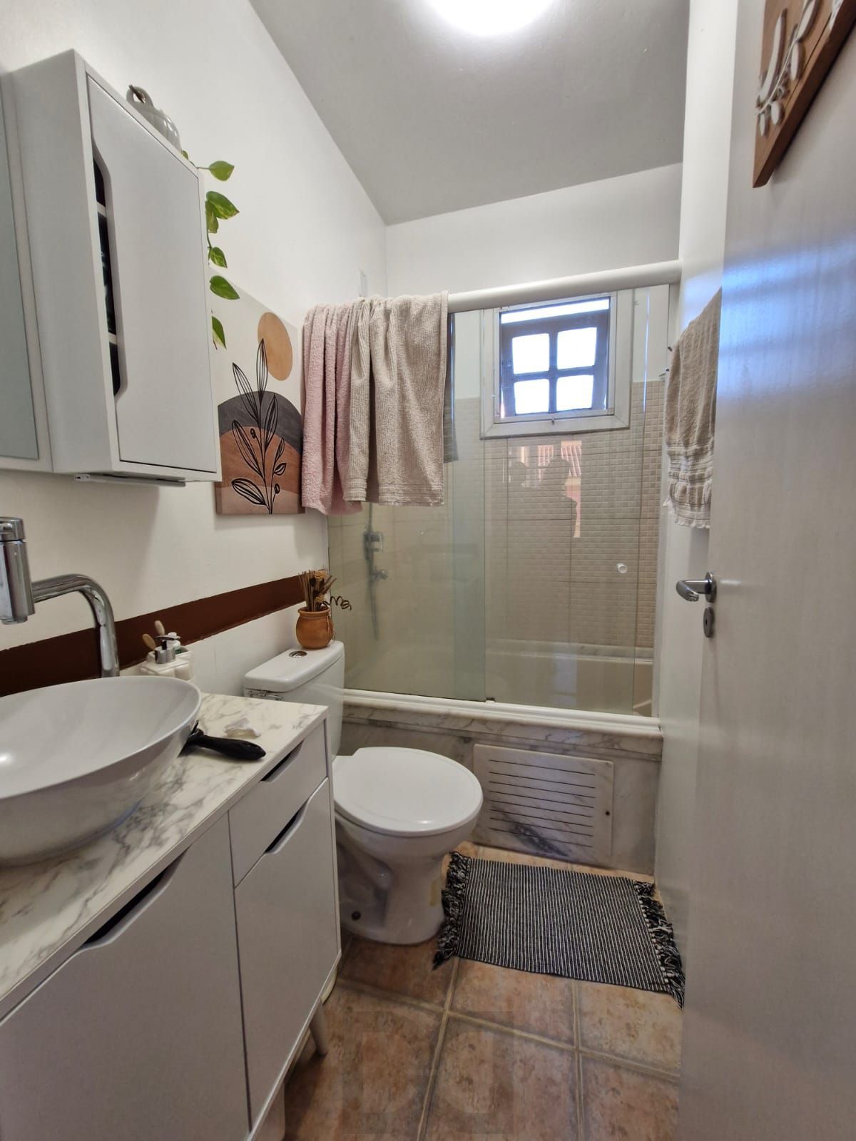 Casa em condomínio no Bairro Medianeira, com 3 dormitórios, sendo 1 suíte, e 1 vaga de garagem. — foto 11