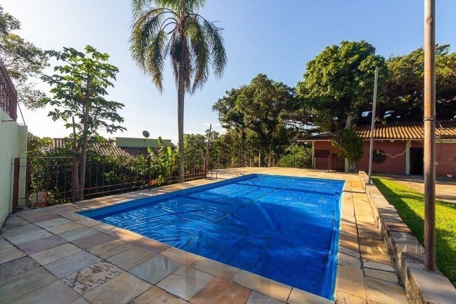 Casa 4 Dormitórios, piscina, bairro Teresópolis — foto 8