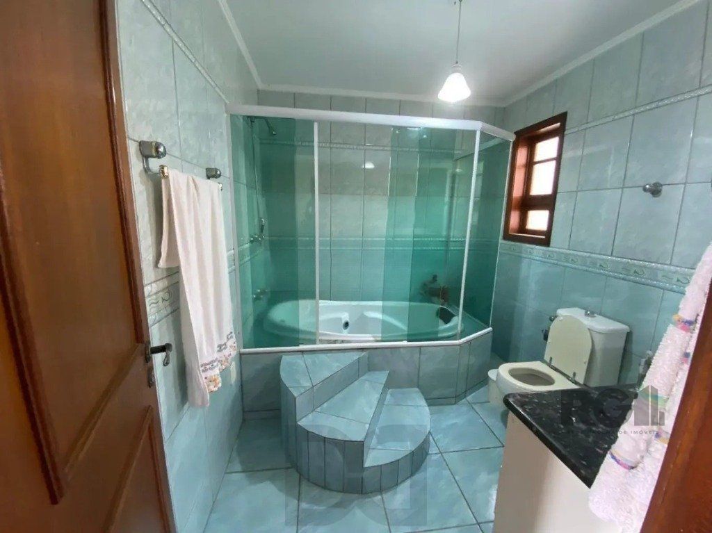 Casa com 4 dormitórios no bairro nonoai — foto 13