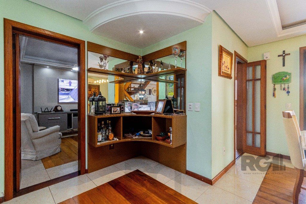 Casa de 4 dormitórios 304m² no bairro Jardim Lindóia — foto 16