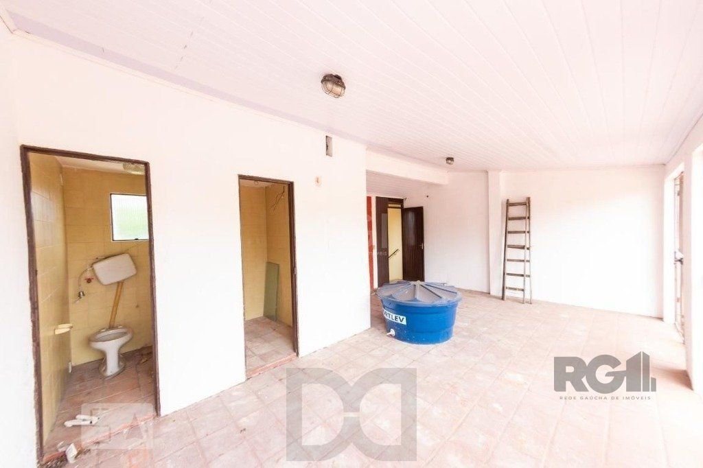 Casa para Venda - 450m², 4 dormitórios, sendo 3 suites, 5 vagas - Nonoai — foto 27