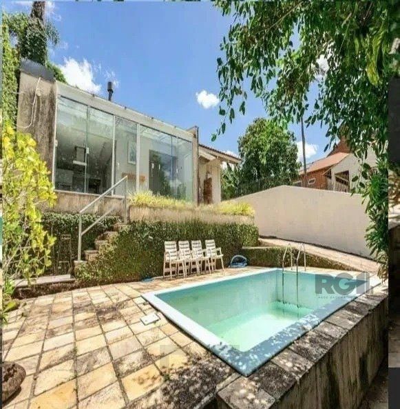 Excelente casa de 220m² com 3 dormitórios no bairro Tristeza. — foto 29