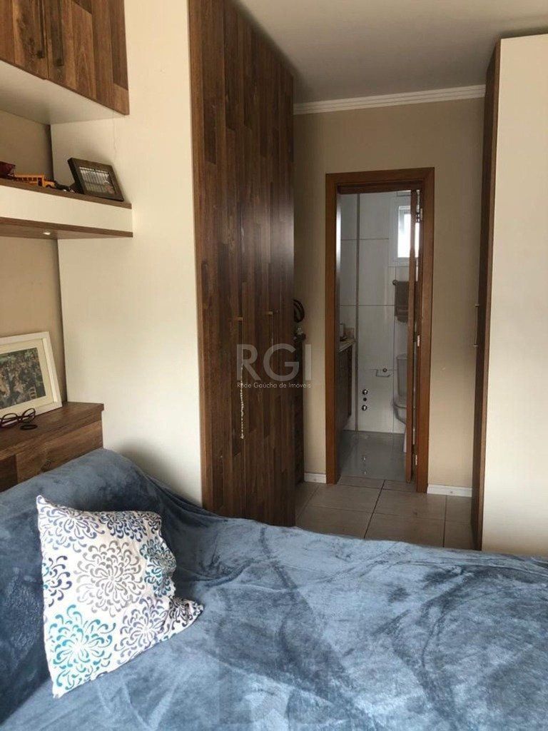 Casa com 03 dormitórios, 01 suíte, pátio com churrasqueira e 03 vagas de garagem no bairro Tristeza — foto 16