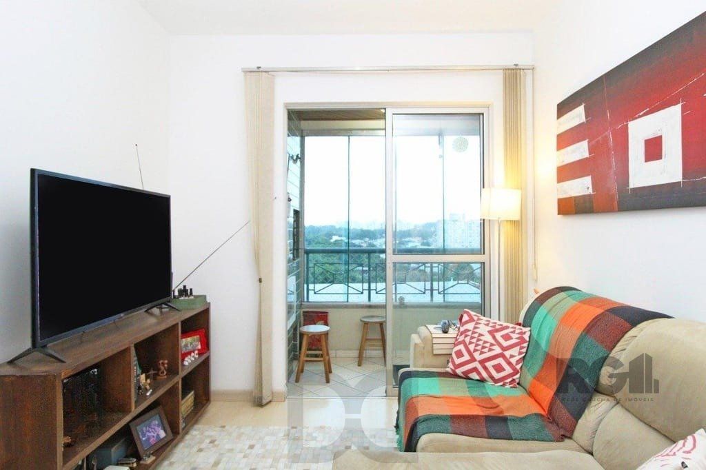 Apartamento 59m² - 2 dormitórios e 1 vaga no bairro Cavalhada — foto 1