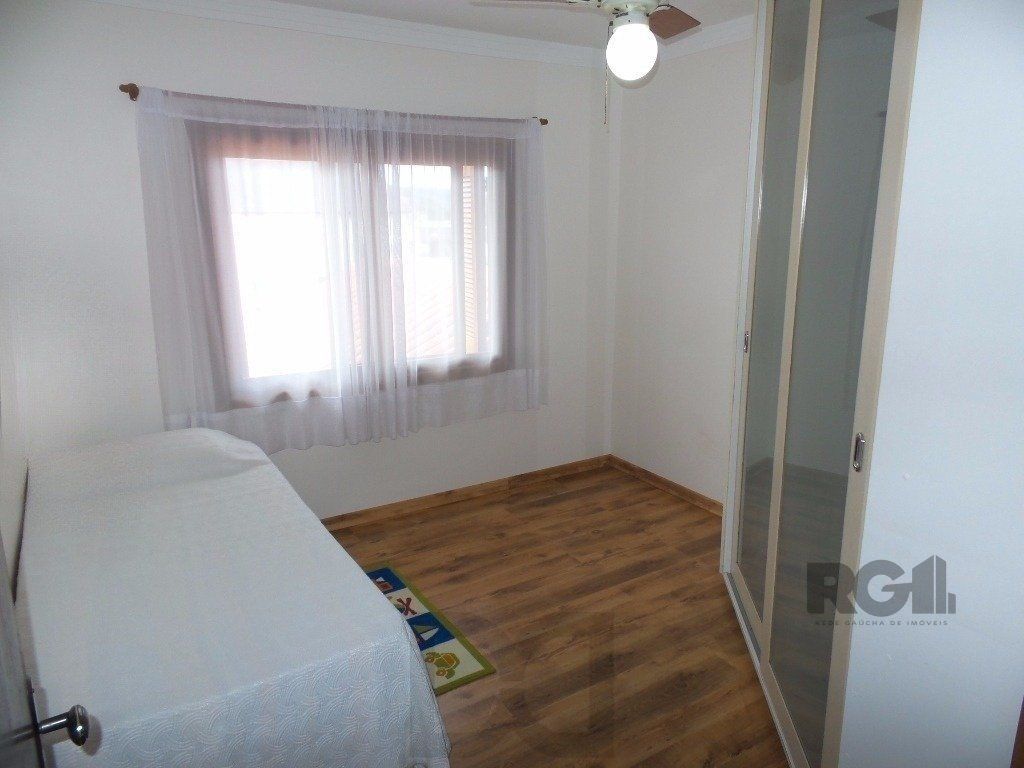 Excelente casa em condomínio com 3 dormitórios e 4 vagas. — foto 12