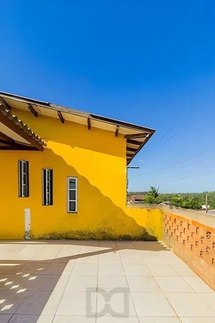 casa de 4 dormitórios, no bairro Lomba do Pinheiro — foto 2