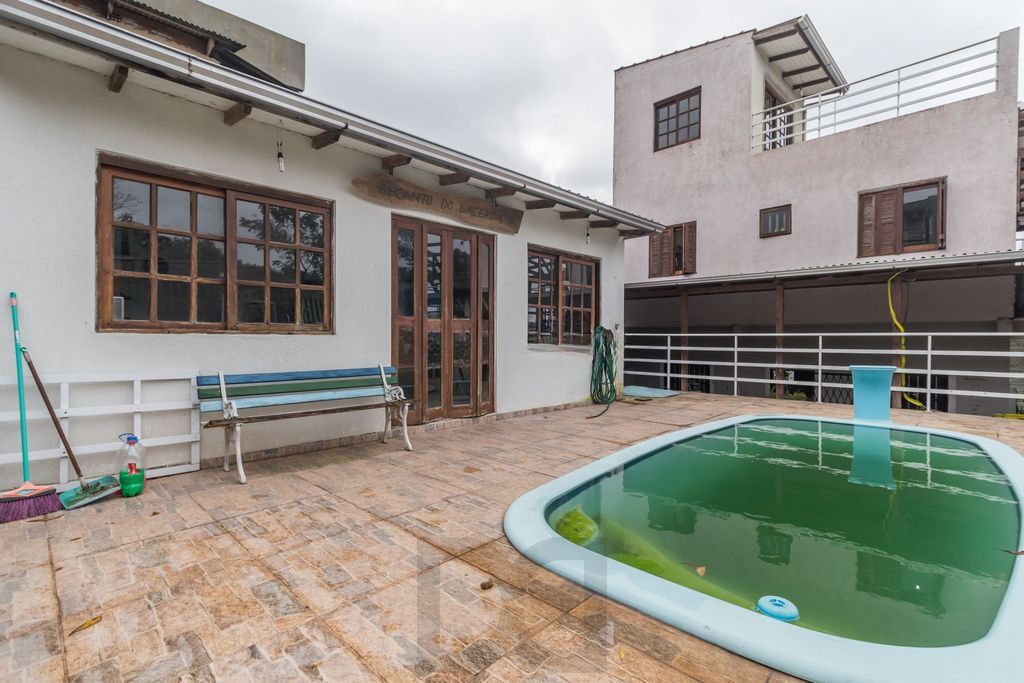 Casa de 6 dormitórios à venda Bairro Vila Nova - Porto Alegre — foto 38