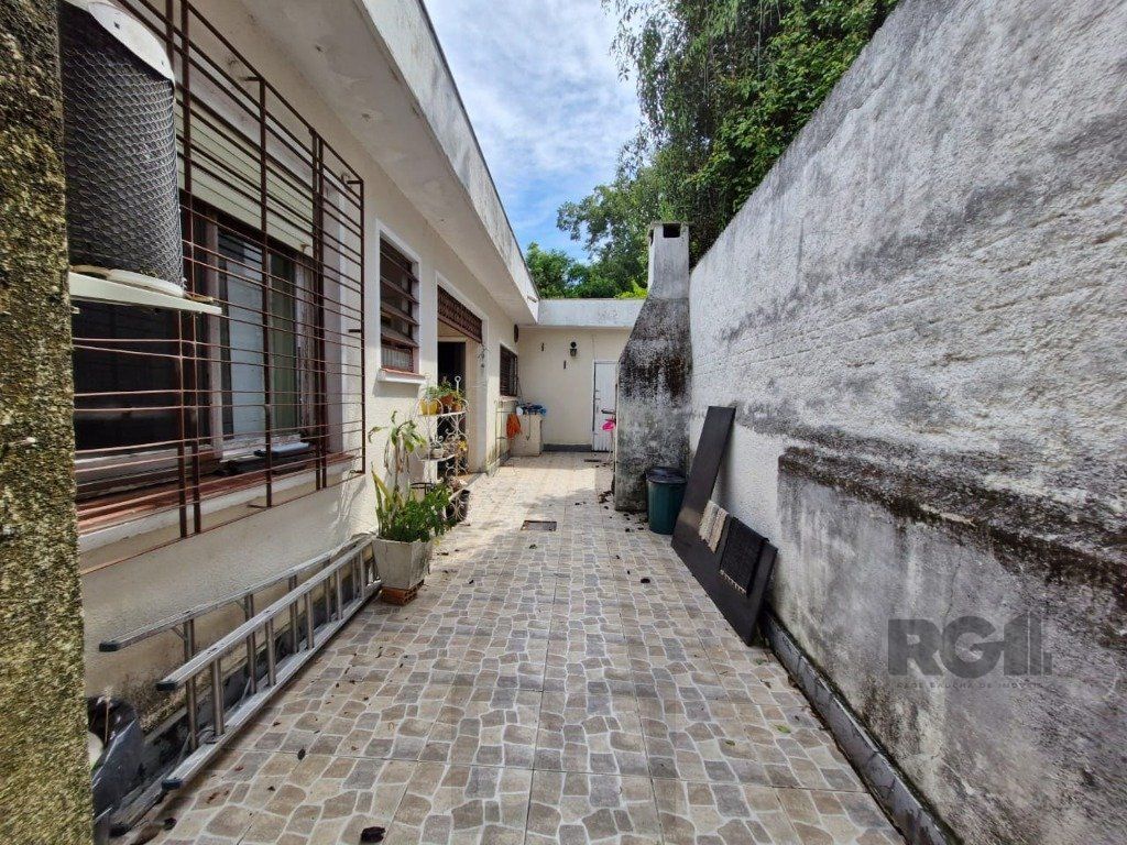 Casa 4 Dormitórios Bairro Teresópolis — foto 23